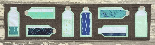 the workroom - bottled up - row by row